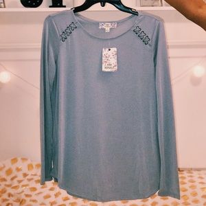 Two Long Sleeve shirts (brand new/never worn)